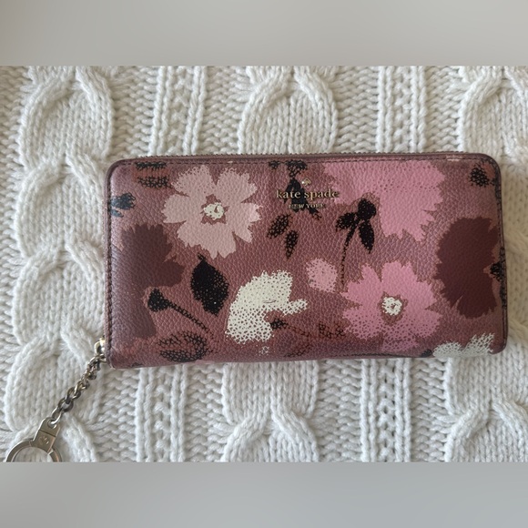 kate spade Handbags - kate spade floral zip-around wallet in mauve and pink